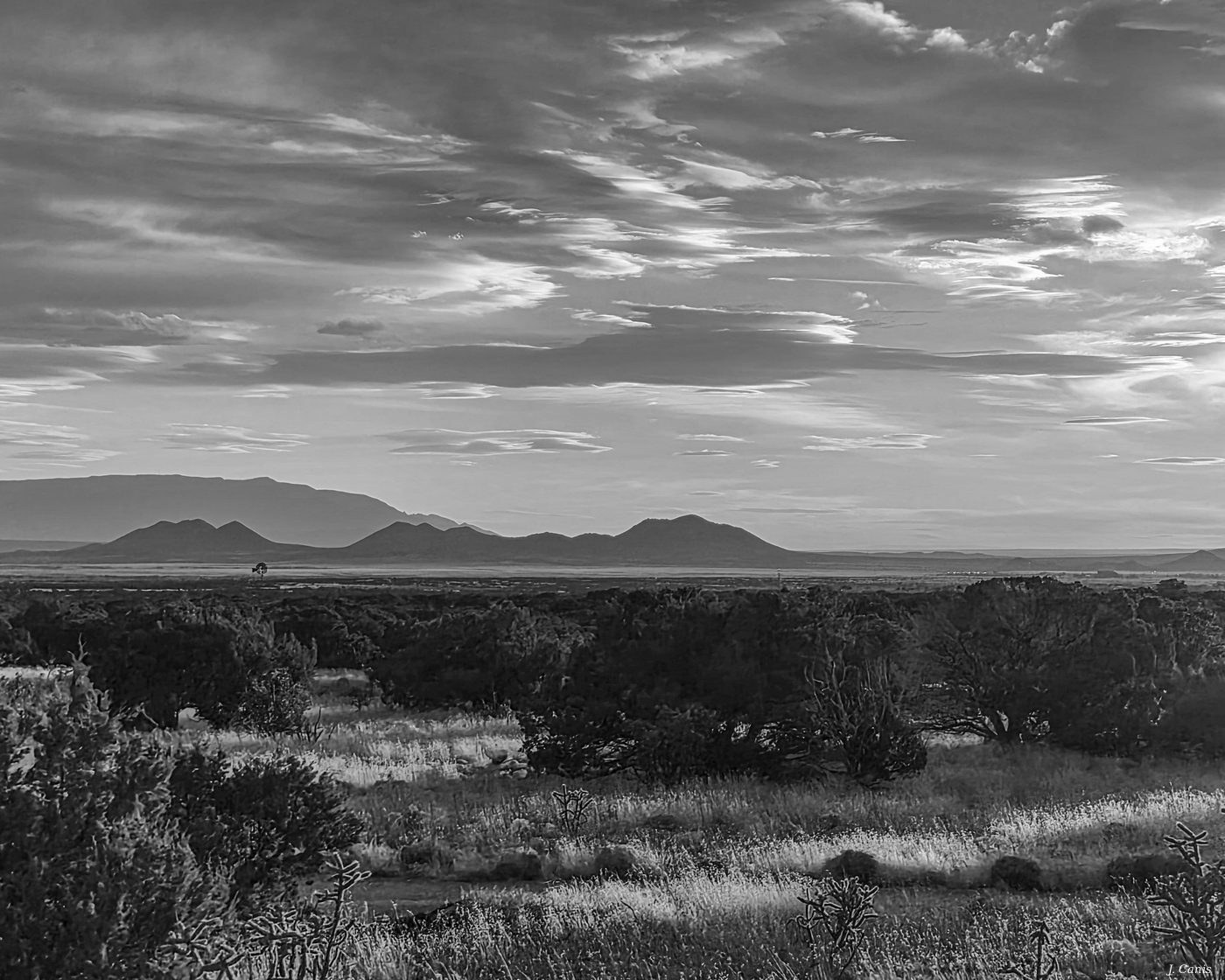 New Mexico Skies — dramatic cloudscape over high desert, Southwest black and white photography by Jon Canis